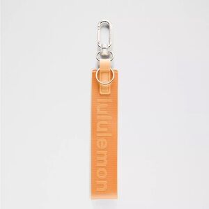 Lululemon Never Lost Keychain-Rock Melon/Lit Orange New with tags